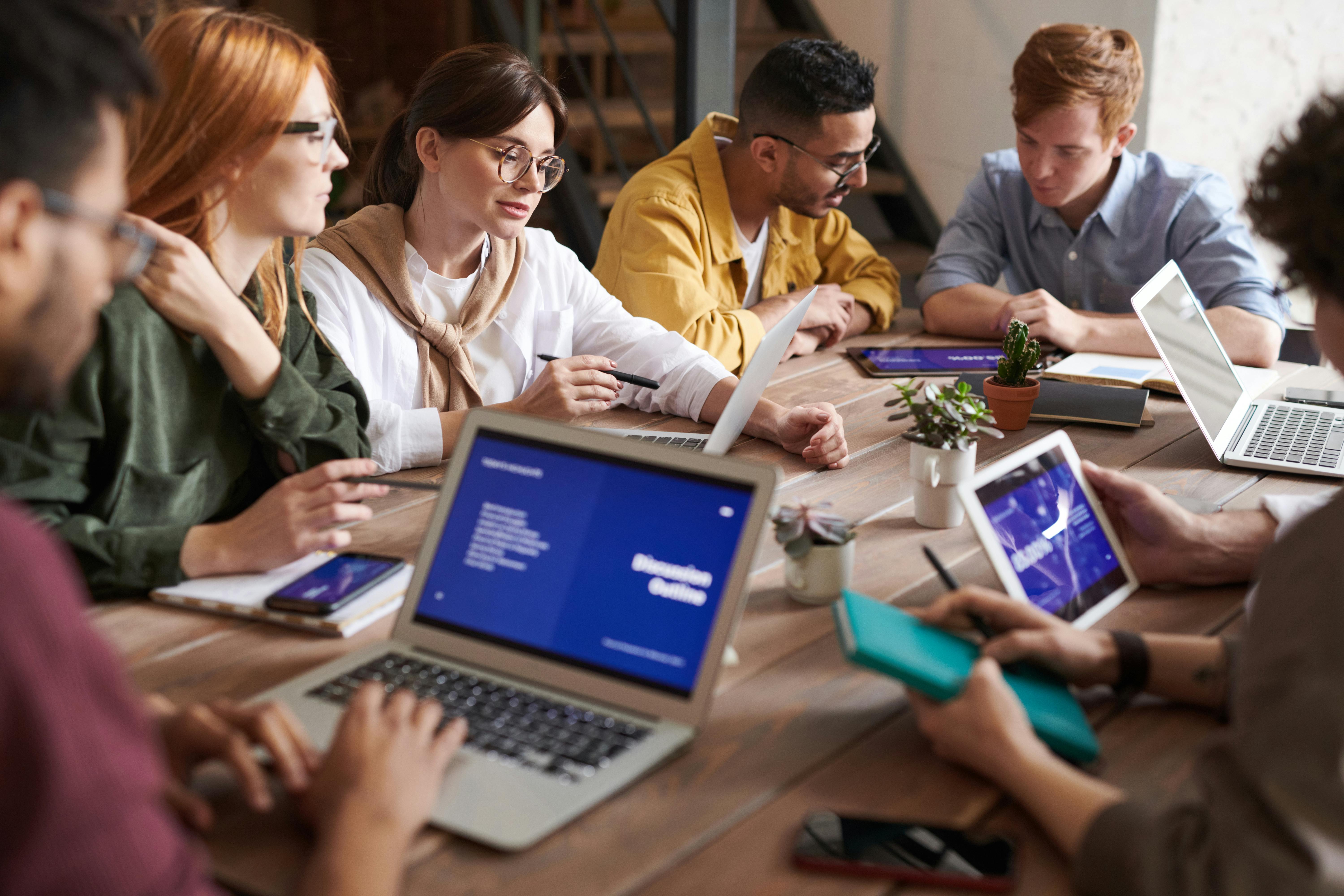 Diverse team using enterprise software together